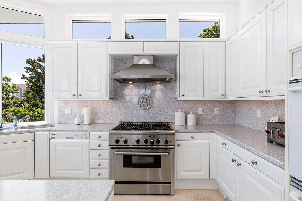The Estate in Mashpee boasts every imaginable amenity for any occasion and total privacy with a breathtaking backdrop, now available for sale. This home located at 78 Triton Way, Mashpee, Massachusetts