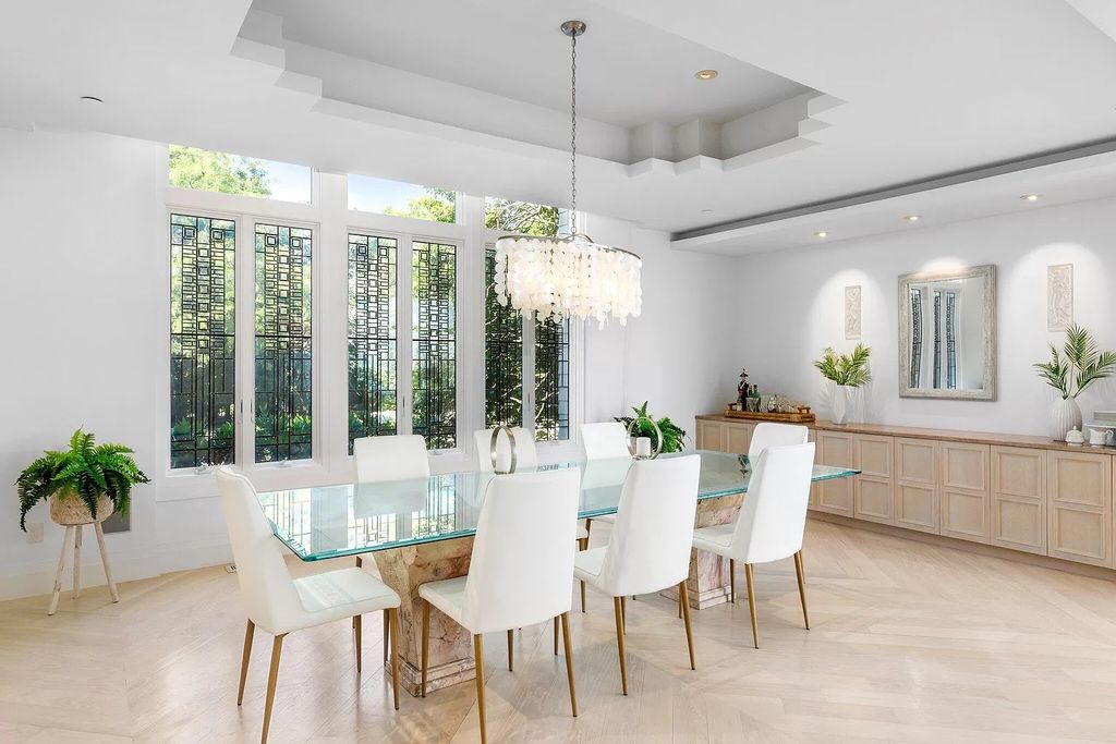 The Estate in Mashpee boasts every imaginable amenity for any occasion and total privacy with a breathtaking backdrop, now available for sale. This home located at 78 Triton Way, Mashpee, Massachusetts