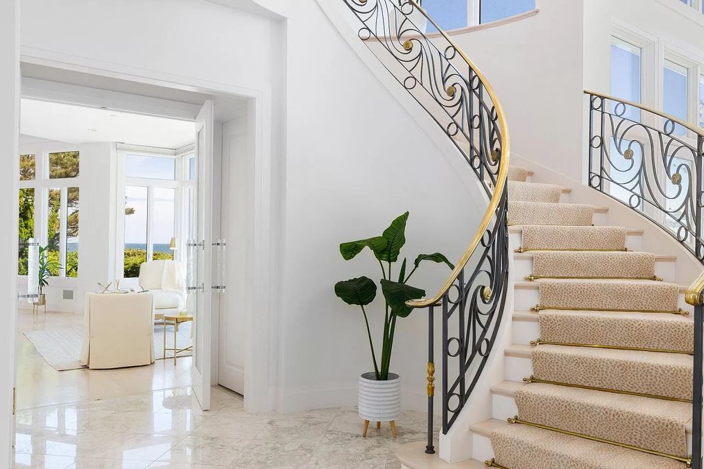 The Estate in Mashpee boasts every imaginable amenity for any occasion and total privacy with a breathtaking backdrop, now available for sale. This home located at 78 Triton Way, Mashpee, Massachusetts