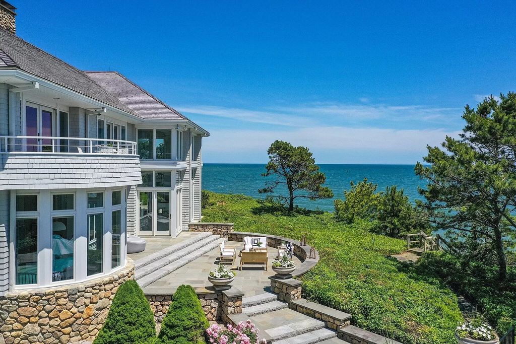 The Estate in Mashpee boasts every imaginable amenity for any occasion and total privacy with a breathtaking backdrop, now available for sale. This home located at 78 Triton Way, Mashpee, Massachusetts