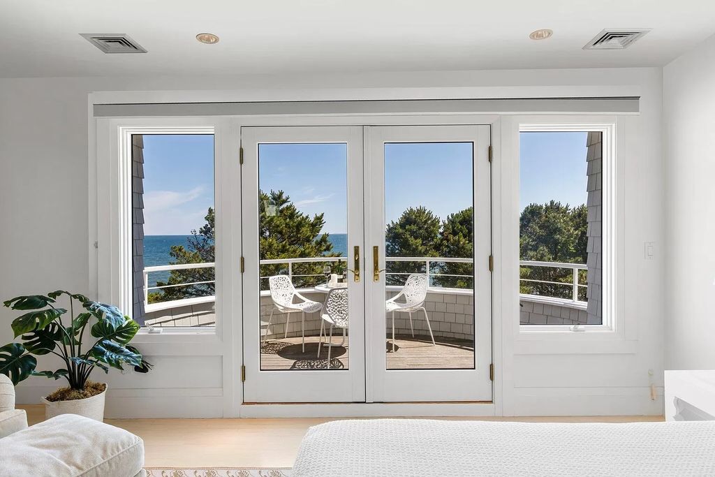 The Estate in Mashpee boasts every imaginable amenity for any occasion and total privacy with a breathtaking backdrop, now available for sale. This home located at 78 Triton Way, Mashpee, Massachusetts