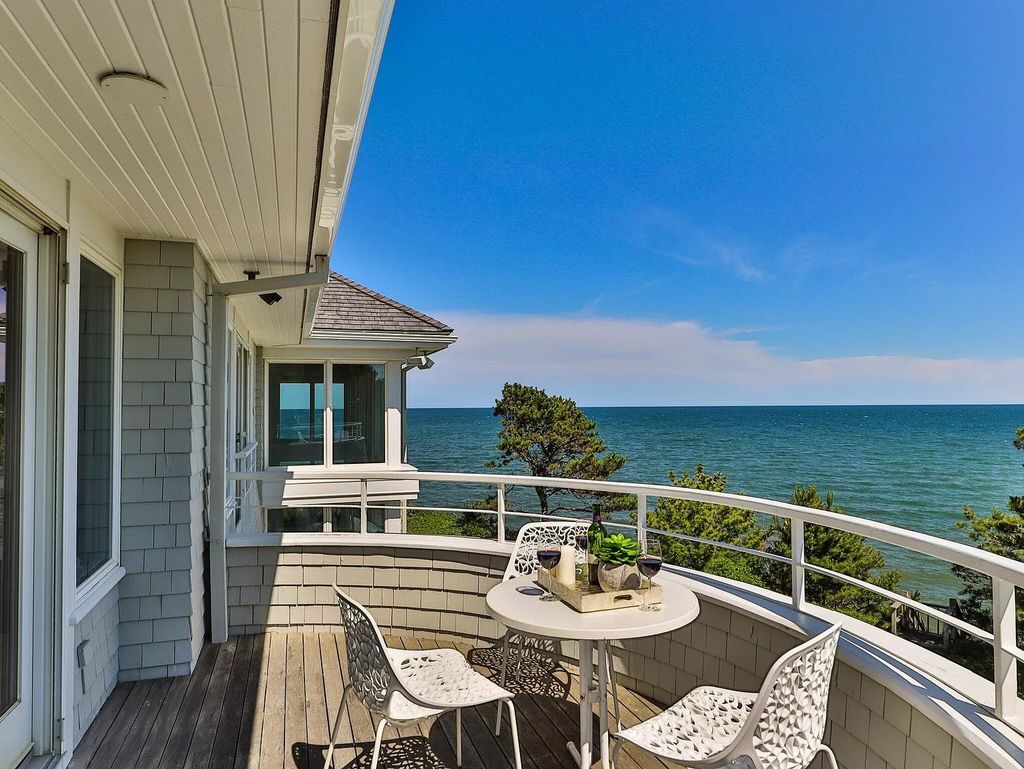The Estate in Mashpee boasts every imaginable amenity for any occasion and total privacy with a breathtaking backdrop, now available for sale. This home located at 78 Triton Way, Mashpee, Massachusetts