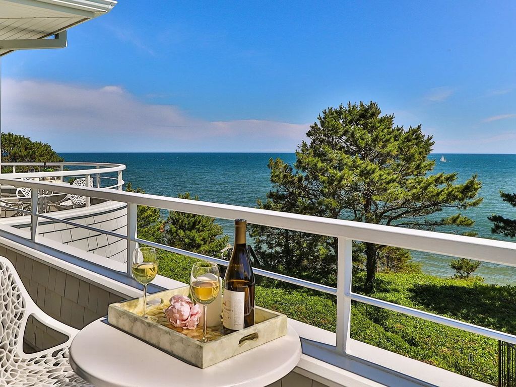 The Estate in Mashpee boasts every imaginable amenity for any occasion and total privacy with a breathtaking backdrop, now available for sale. This home located at 78 Triton Way, Mashpee, Massachusetts