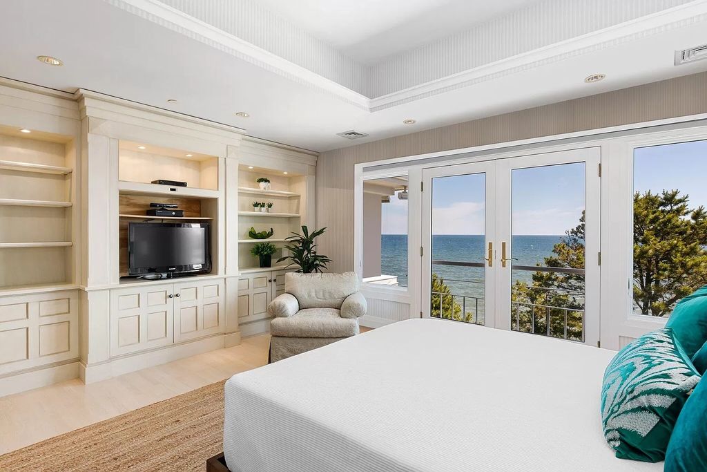 The Estate in Mashpee boasts every imaginable amenity for any occasion and total privacy with a breathtaking backdrop, now available for sale. This home located at 78 Triton Way, Mashpee, Massachusetts
