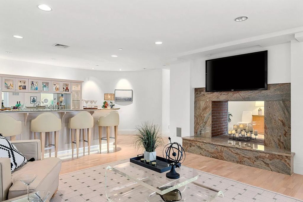 The Estate in Mashpee boasts every imaginable amenity for any occasion and total privacy with a breathtaking backdrop, now available for sale. This home located at 78 Triton Way, Mashpee, Massachusetts