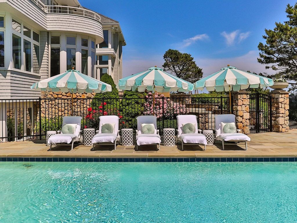 The Estate in Mashpee boasts every imaginable amenity for any occasion and total privacy with a breathtaking backdrop, now available for sale. This home located at 78 Triton Way, Mashpee, Massachusetts