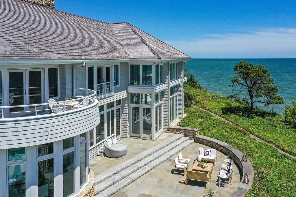 The Estate in Mashpee boasts every imaginable amenity for any occasion and total privacy with a breathtaking backdrop, now available for sale. This home located at 78 Triton Way, Mashpee, Massachusetts