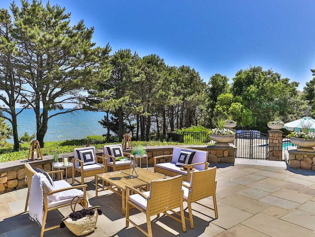 The Estate in Mashpee boasts every imaginable amenity for any occasion and total privacy with a breathtaking backdrop, now available for sale. This home located at 78 Triton Way, Mashpee, Massachusetts
