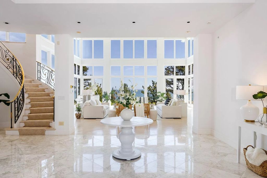 The Estate in Mashpee boasts every imaginable amenity for any occasion and total privacy with a breathtaking backdrop, now available for sale. This home located at 78 Triton Way, Mashpee, Massachusetts