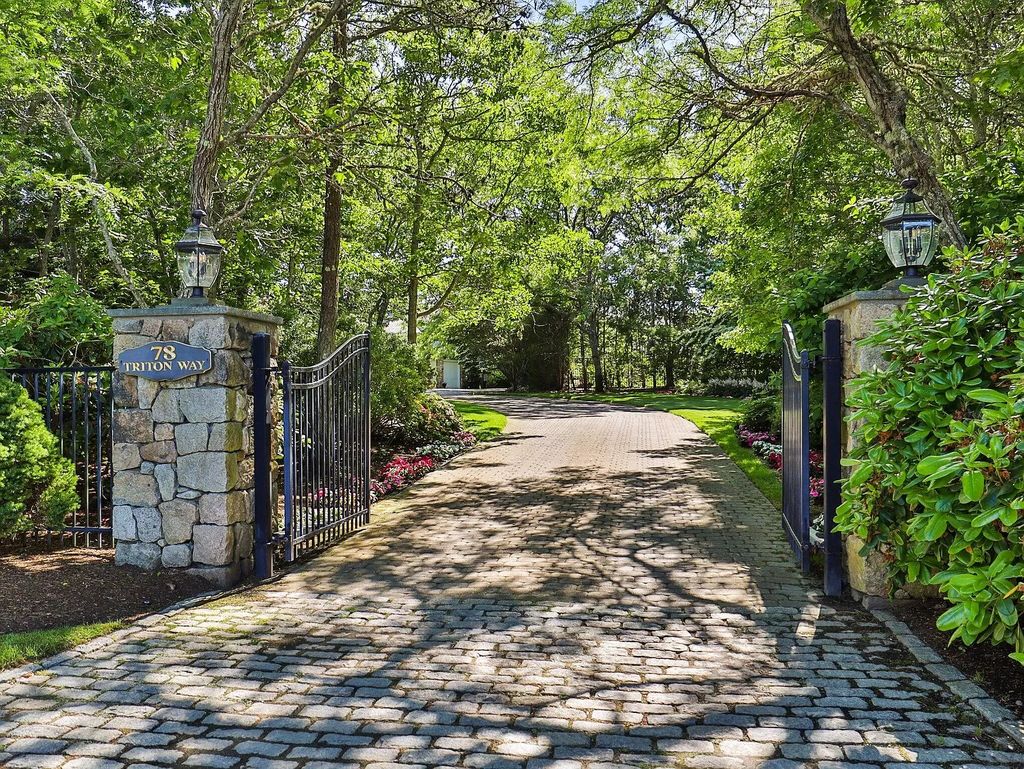 The Estate in Mashpee boasts every imaginable amenity for any occasion and total privacy with a breathtaking backdrop, now available for sale. This home located at 78 Triton Way, Mashpee, Massachusetts