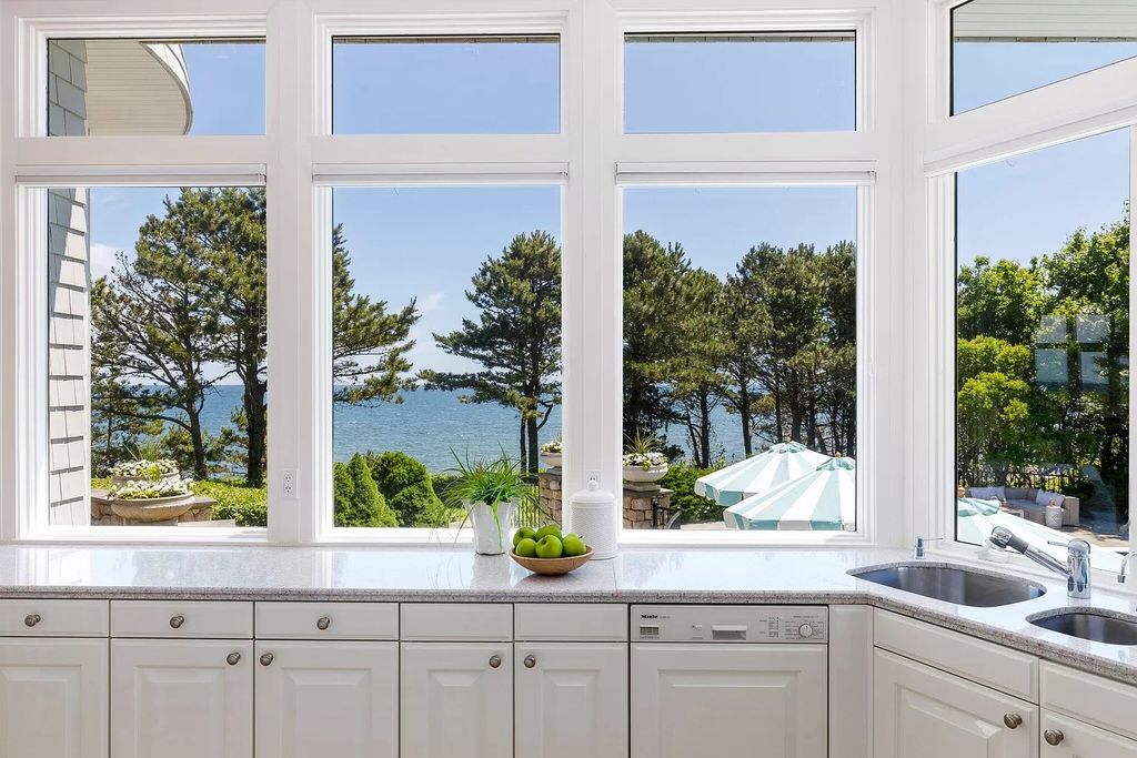 The Estate in Mashpee boasts every imaginable amenity for any occasion and total privacy with a breathtaking backdrop, now available for sale. This home located at 78 Triton Way, Mashpee, Massachusetts