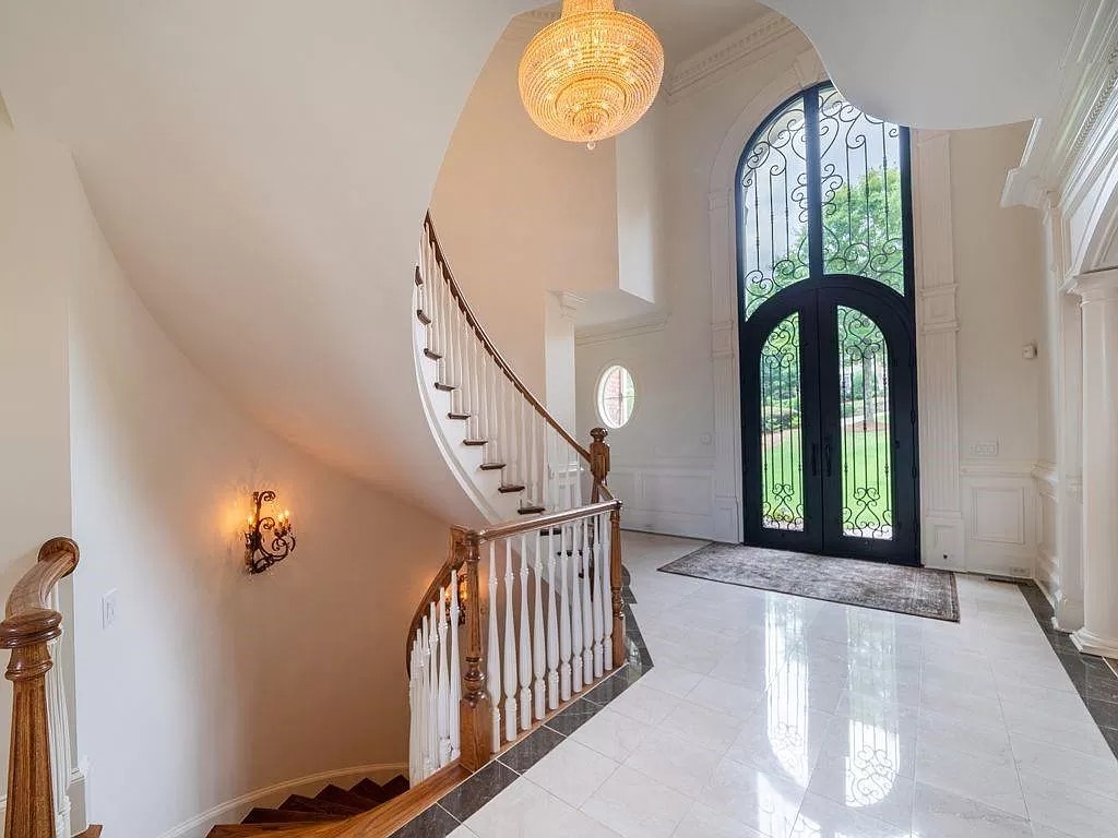 The Estate in Duluth is a luxurious home exuding artfully planned interior now available for sale. This home located at 2681 Lovejoy Cir, Duluth, Georgia; offering 06 bedrooms and 08 bathrooms with 10,886 square feet of living spaces.