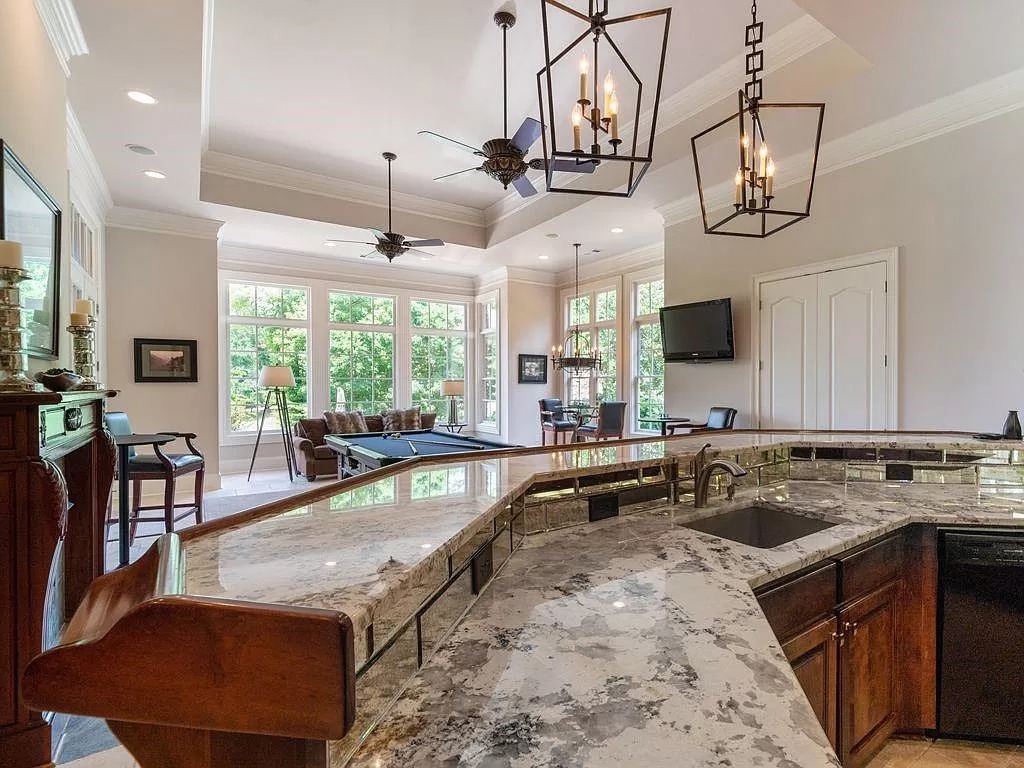 The Estate in Duluth is a luxurious home exuding artfully planned interior now available for sale. This home located at 2681 Lovejoy Cir, Duluth, Georgia; offering 06 bedrooms and 08 bathrooms with 10,886 square feet of living spaces.