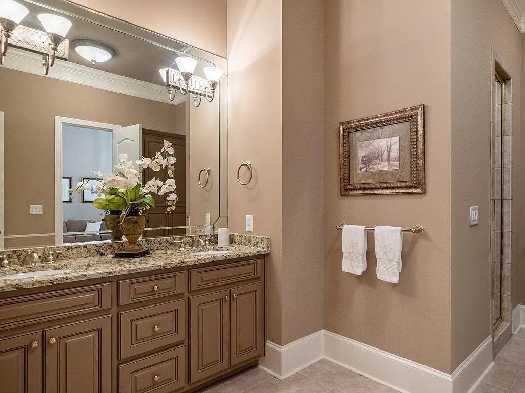 The Estate in Duluth is a luxurious home exuding artfully planned interior now available for sale. This home located at 2681 Lovejoy Cir, Duluth, Georgia; offering 06 bedrooms and 08 bathrooms with 10,886 square feet of living spaces.