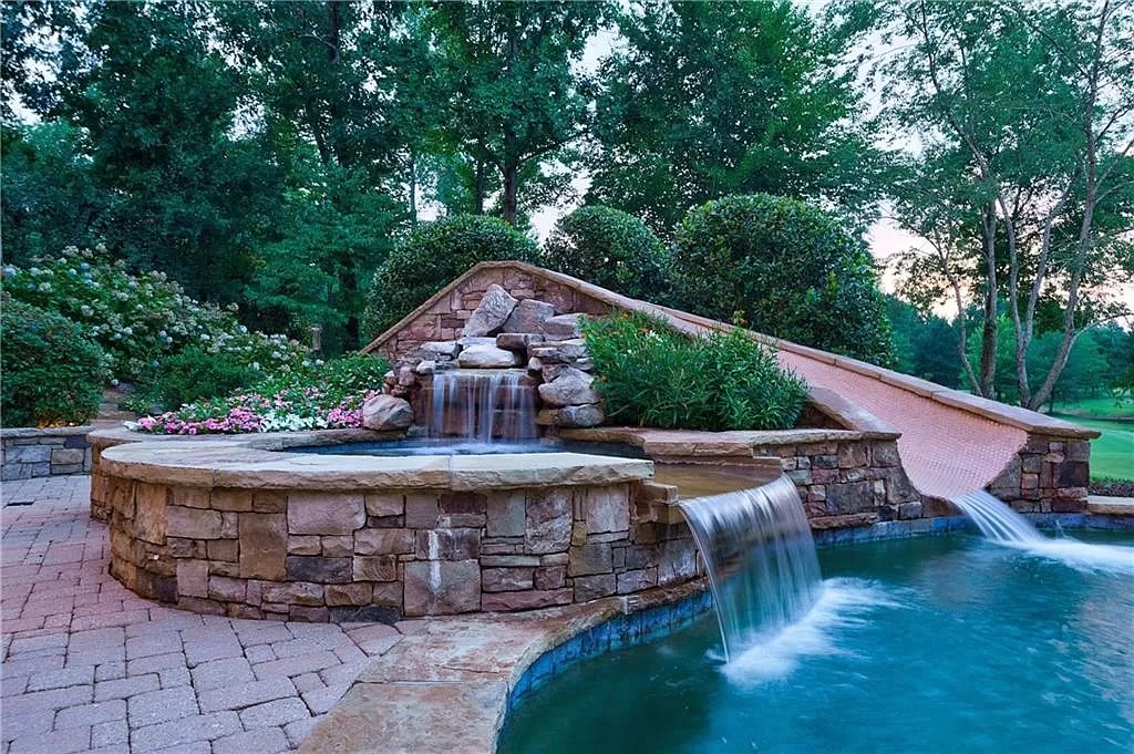 The Estate in Duluth is a luxurious home exuding artfully planned interior now available for sale. This home located at 2681 Lovejoy Cir, Duluth, Georgia; offering 06 bedrooms and 08 bathrooms with 10,886 square feet of living spaces.