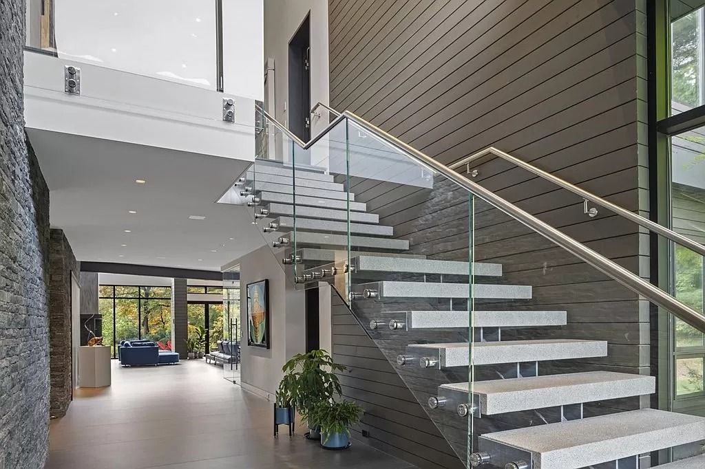 The Estate in Westwood is a luxurious home perfectly set at the end of a secluded acres now available for sale. This home located at 300 Summer St, Westwood, Massachusetts; offering 06 bedrooms and 09 bathrooms with 10,309 square feet of living spaces. 