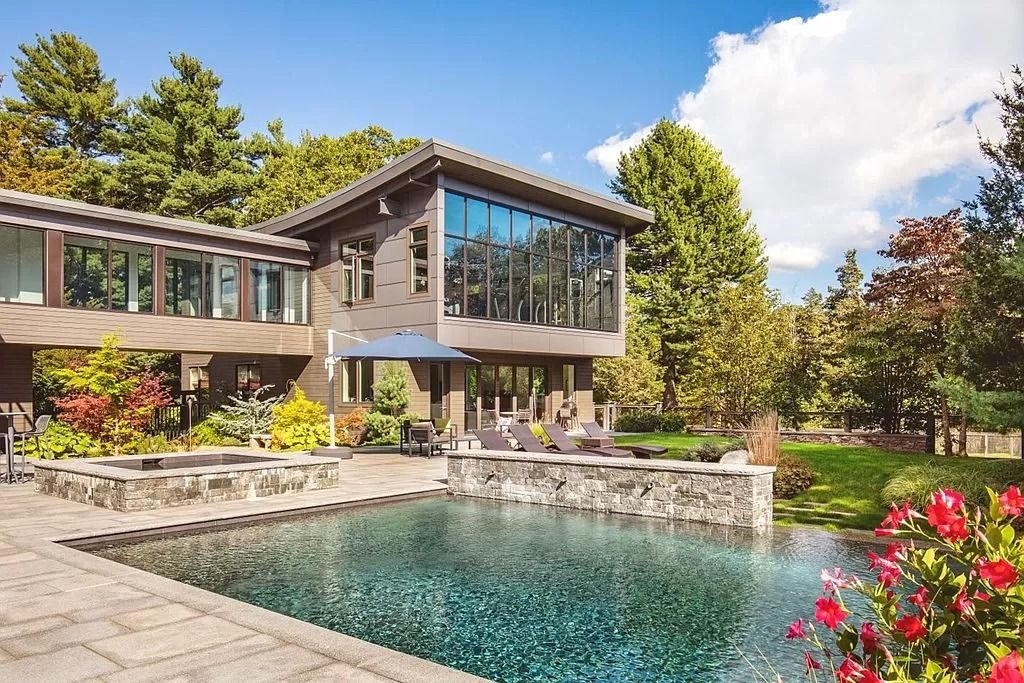 The Estate in Westwood is a luxurious home perfectly set at the end of a secluded acres now available for sale. This home located at 300 Summer St, Westwood, Massachusetts; offering 06 bedrooms and 09 bathrooms with 10,309 square feet of living spaces. 
