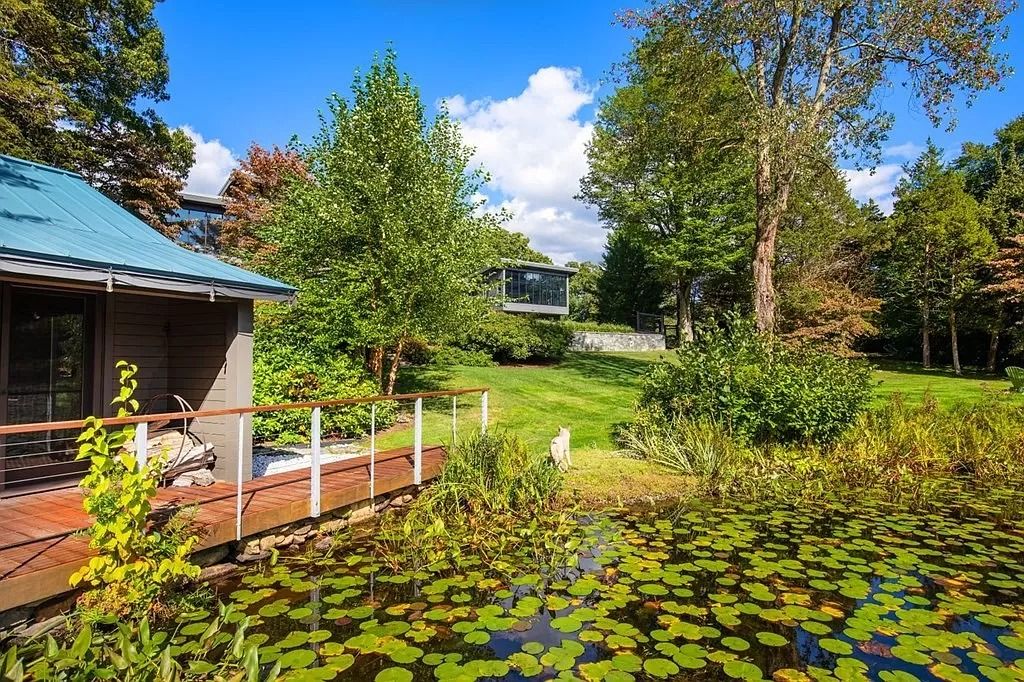 The Estate in Westwood is a luxurious home perfectly set at the end of a secluded acres now available for sale. This home located at 300 Summer St, Westwood, Massachusetts; offering 06 bedrooms and 09 bathrooms with 10,309 square feet of living spaces. 