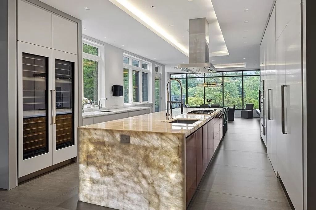 The Estate in Westwood is a luxurious home perfectly set at the end of a secluded acres now available for sale. This home located at 300 Summer St, Westwood, Massachusetts; offering 06 bedrooms and 09 bathrooms with 10,309 square feet of living spaces. 