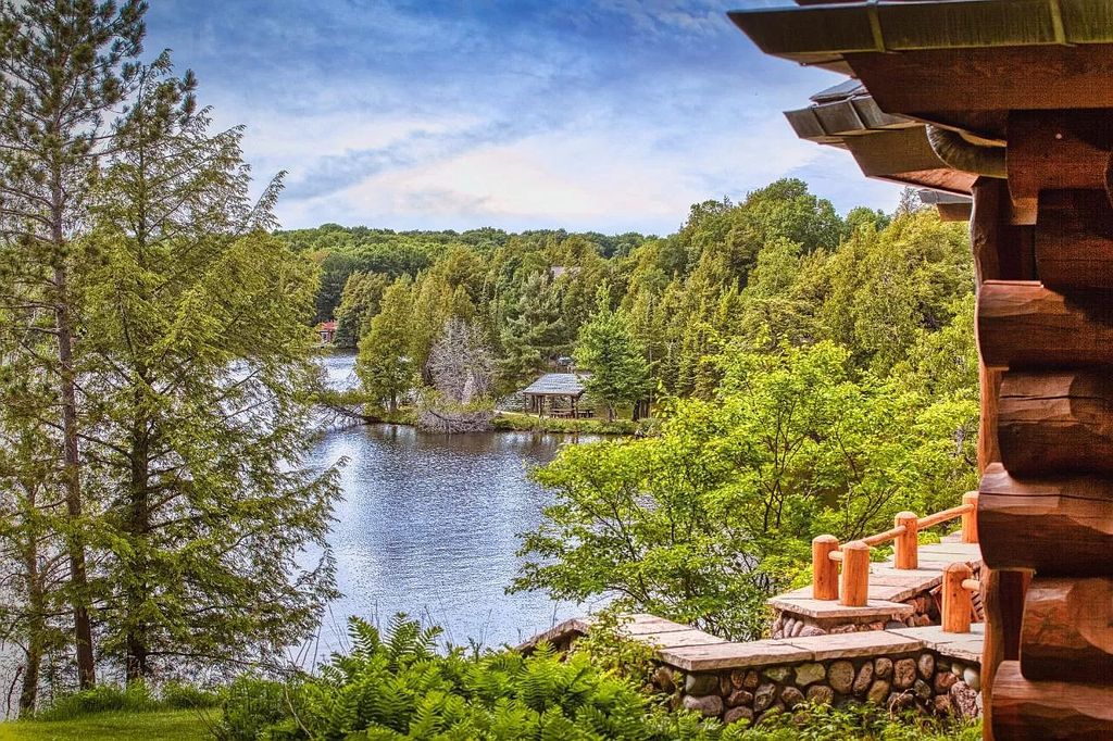 The Estate in Watersmeet is a luxurious home commanding panoramic lake views from all points now available for sale. This home located at 19210 Mamie Lake Rd W, Watersmeet, Michigan; offering 07 bedrooms and 07 bathrooms with 10,004 square feet of living spaces. 