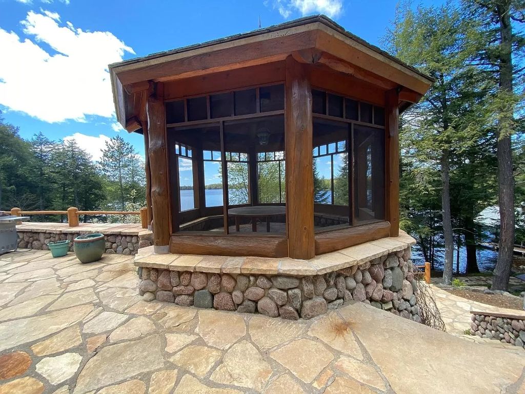 The Estate in Watersmeet is a luxurious home commanding panoramic lake views from all points now available for sale. This home located at 19210 Mamie Lake Rd W, Watersmeet, Michigan; offering 07 bedrooms and 07 bathrooms with 10,004 square feet of living spaces. 