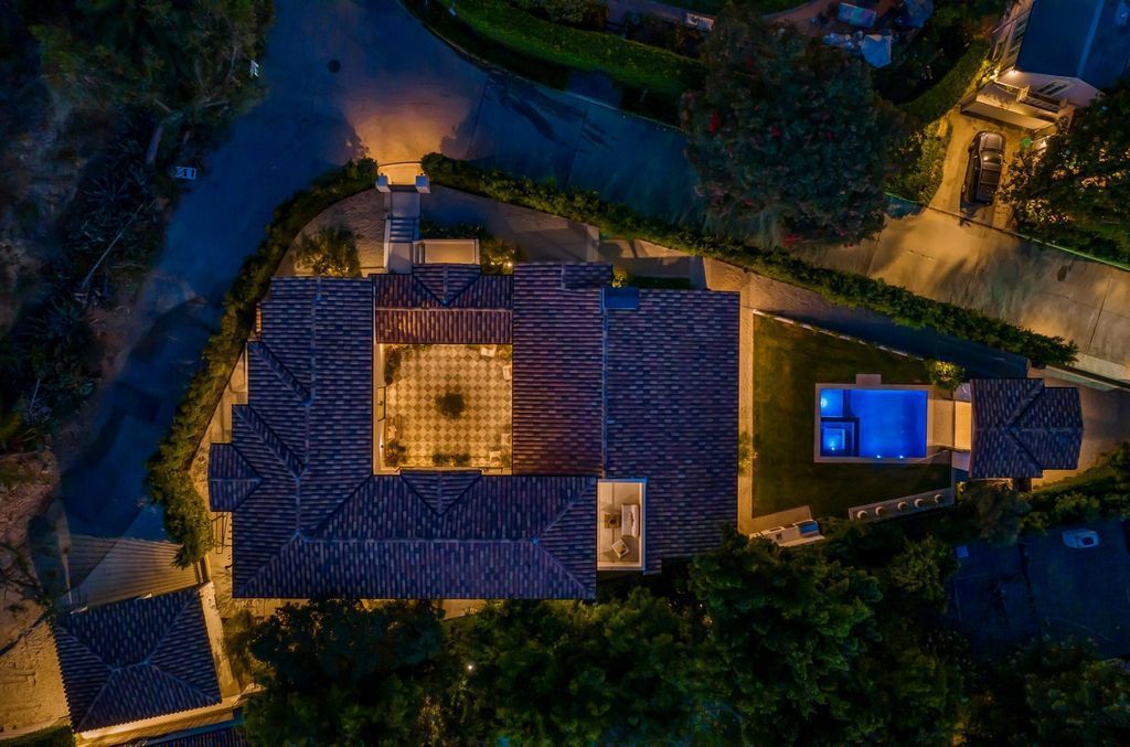 The House is Hollywood Hills, a spectacular Italian inspired villa with natural light flowing through the large windows and doors, enjoy views of the city, pool, and verdant landscaping is now available for sale. This home located at 9165 Cordell Dr, Los Angeles, California