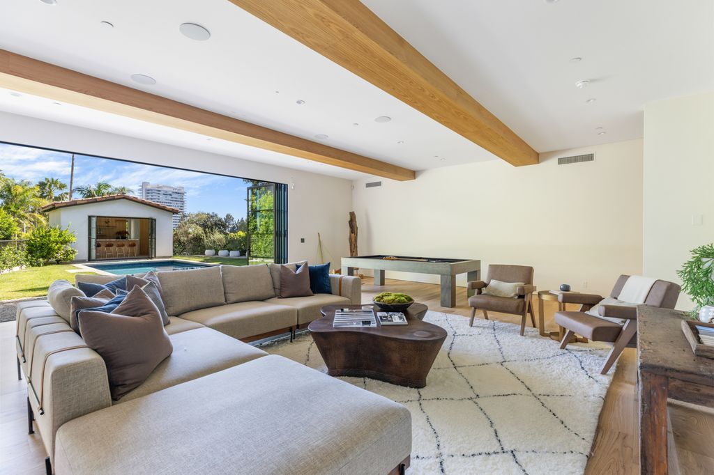 The House is Hollywood Hills, a spectacular Italian inspired villa with natural light flowing through the large windows and doors, enjoy views of the city, pool, and verdant landscaping is now available for sale. This home located at 9165 Cordell Dr, Los Angeles, California