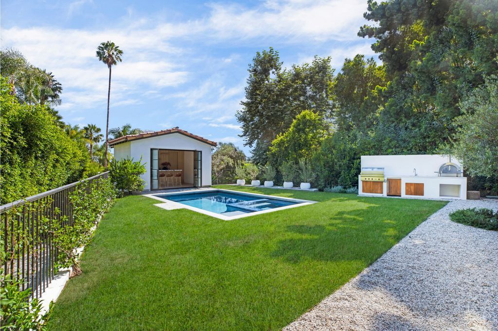 The House is Hollywood Hills, a spectacular Italian inspired villa with natural light flowing through the large windows and doors, enjoy views of the city, pool, and verdant landscaping is now available for sale. This home located at 9165 Cordell Dr, Los Angeles, California