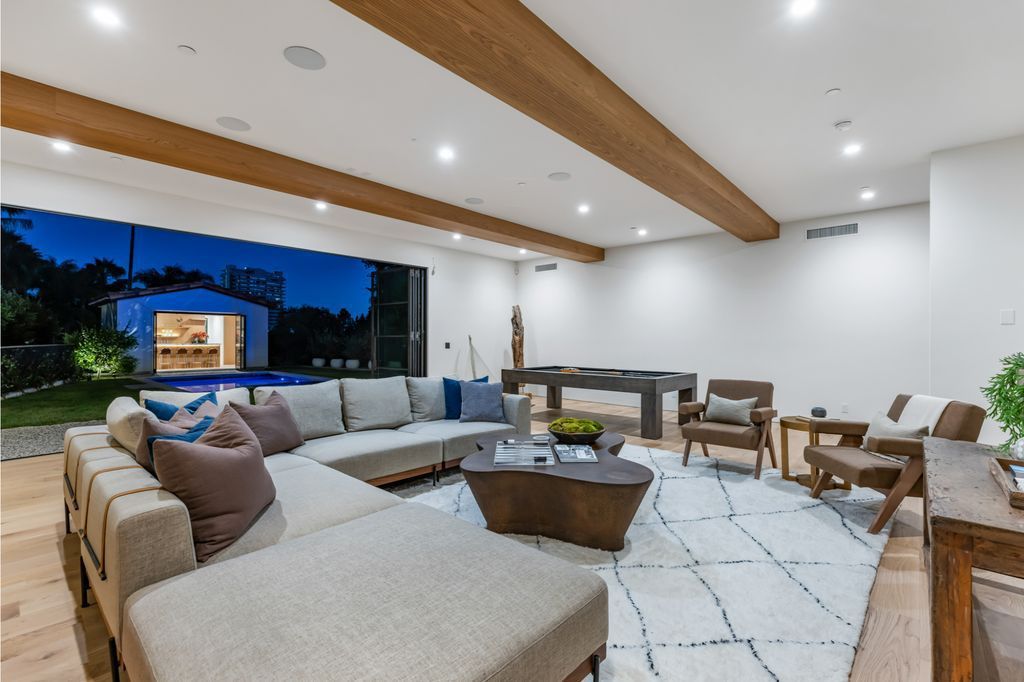 The House is Hollywood Hills, a spectacular Italian inspired villa with natural light flowing through the large windows and doors, enjoy views of the city, pool, and verdant landscaping is now available for sale. This home located at 9165 Cordell Dr, Los Angeles, California