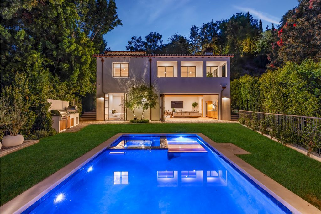 The House is Hollywood Hills, a spectacular Italian inspired villa with natural light flowing through the large windows and doors, enjoy views of the city, pool, and verdant landscaping is now available for sale. This home located at 9165 Cordell Dr, Los Angeles, California