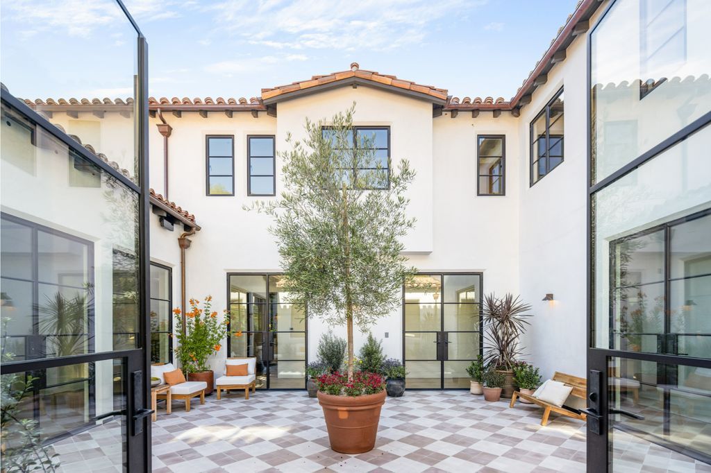 The House is Hollywood Hills, a spectacular Italian inspired villa with natural light flowing through the large windows and doors, enjoy views of the city, pool, and verdant landscaping is now available for sale. This home located at 9165 Cordell Dr, Los Angeles, California