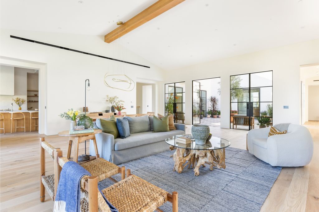 The House is Hollywood Hills, a spectacular Italian inspired villa with natural light flowing through the large windows and doors, enjoy views of the city, pool, and verdant landscaping is now available for sale. This home located at 9165 Cordell Dr, Los Angeles, California