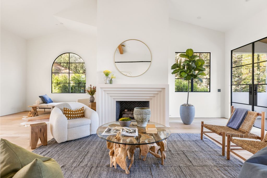 The House is Hollywood Hills, a spectacular Italian inspired villa with natural light flowing through the large windows and doors, enjoy views of the city, pool, and verdant landscaping is now available for sale. This home located at 9165 Cordell Dr, Los Angeles, California
