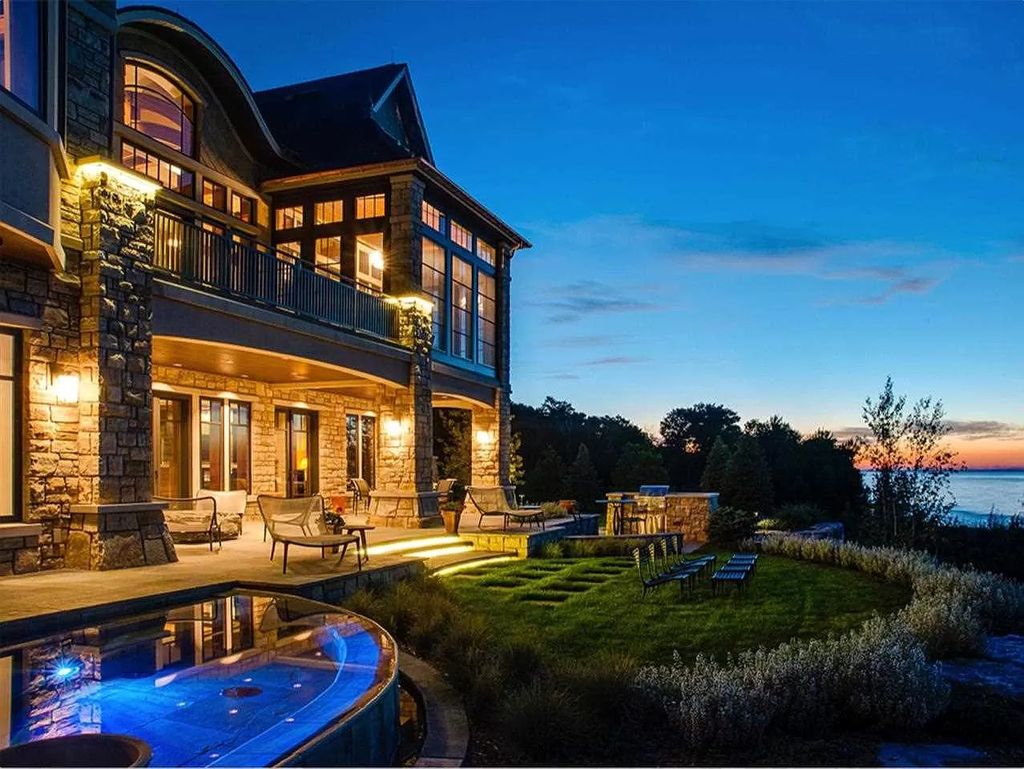 The Estate in Bay Harbor is a luxurious home featuring distinctive exterior with solid stone masonry, limestone and cedar shake, constantly maintained and consistently updated as well as incorporating current technologies and luxury now available for sale. This home located at 6494 Bay Ridge Dr, Bay Harbor, Michigan; offering 04 bedrooms and 05 bathrooms with 6,444 square feet of living spaces.