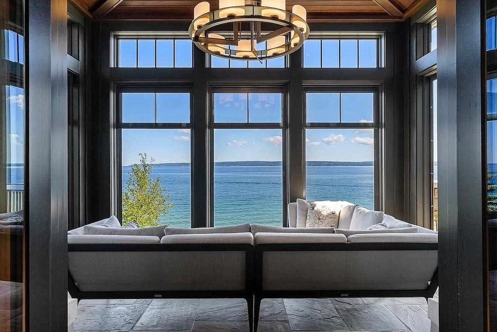 The Estate in Bay Harbor is a luxurious home featuring distinctive exterior with solid stone masonry, limestone and cedar shake, constantly maintained and consistently updated as well as incorporating current technologies and luxury now available for sale. This home located at 6494 Bay Ridge Dr, Bay Harbor, Michigan; offering 04 bedrooms and 05 bathrooms with 6,444 square feet of living spaces.