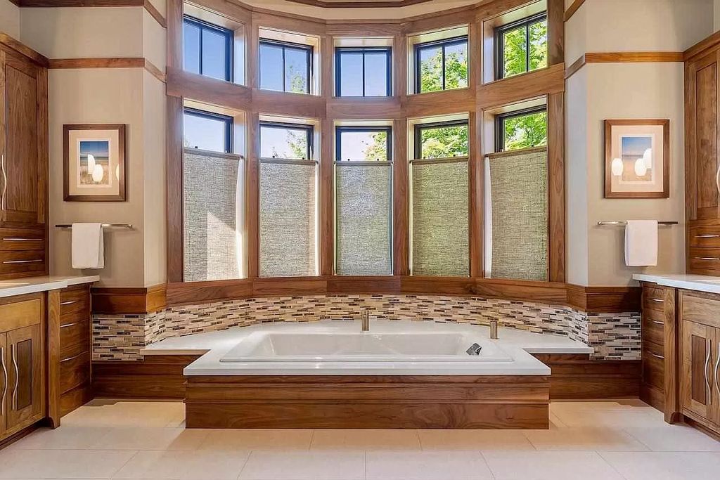 The Estate in Bay Harbor is a luxurious home featuring distinctive exterior with solid stone masonry, limestone and cedar shake, constantly maintained and consistently updated as well as incorporating current technologies and luxury now available for sale. This home located at 6494 Bay Ridge Dr, Bay Harbor, Michigan; offering 04 bedrooms and 05 bathrooms with 6,444 square feet of living spaces.