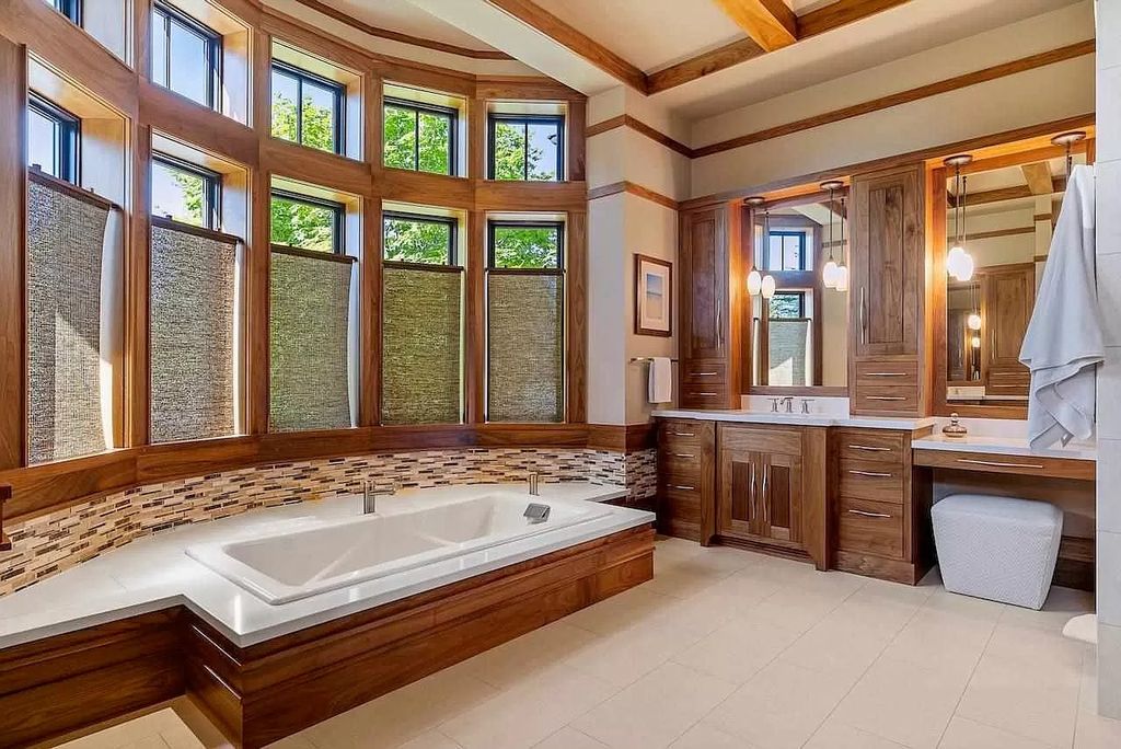 The Estate in Bay Harbor is a luxurious home featuring distinctive exterior with solid stone masonry, limestone and cedar shake, constantly maintained and consistently updated as well as incorporating current technologies and luxury now available for sale. This home located at 6494 Bay Ridge Dr, Bay Harbor, Michigan; offering 04 bedrooms and 05 bathrooms with 6,444 square feet of living spaces.