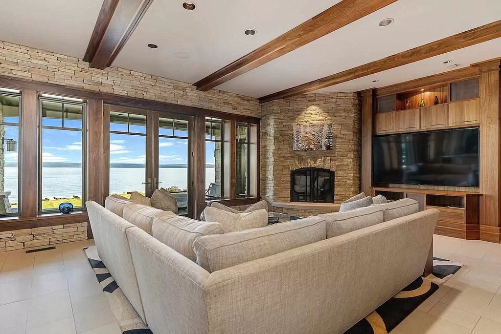 The Estate in Bay Harbor is a luxurious home featuring distinctive exterior with solid stone masonry, limestone and cedar shake, constantly maintained and consistently updated as well as incorporating current technologies and luxury now available for sale. This home located at 6494 Bay Ridge Dr, Bay Harbor, Michigan; offering 04 bedrooms and 05 bathrooms with 6,444 square feet of living spaces.