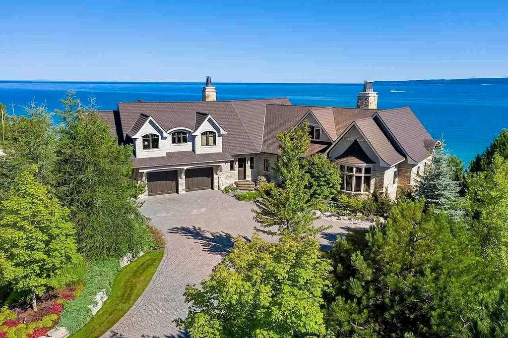 The Estate in Bay Harbor is a luxurious home featuring distinctive exterior with solid stone masonry, limestone and cedar shake, constantly maintained and consistently updated as well as incorporating current technologies and luxury now available for sale. This home located at 6494 Bay Ridge Dr, Bay Harbor, Michigan; offering 04 bedrooms and 05 bathrooms with 6,444 square feet of living spaces.