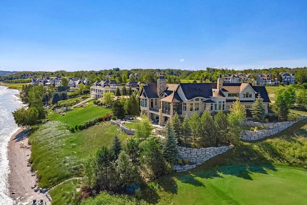 The Estate in Bay Harbor is a luxurious home featuring distinctive exterior with solid stone masonry, limestone and cedar shake, constantly maintained and consistently updated as well as incorporating current technologies and luxury now available for sale. This home located at 6494 Bay Ridge Dr, Bay Harbor, Michigan; offering 04 bedrooms and 05 bathrooms with 6,444 square feet of living spaces.