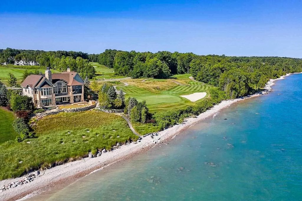 The Estate in Bay Harbor is a luxurious home featuring distinctive exterior with solid stone masonry, limestone and cedar shake, constantly maintained and consistently updated as well as incorporating current technologies and luxury now available for sale. This home located at 6494 Bay Ridge Dr, Bay Harbor, Michigan; offering 04 bedrooms and 05 bathrooms with 6,444 square feet of living spaces.