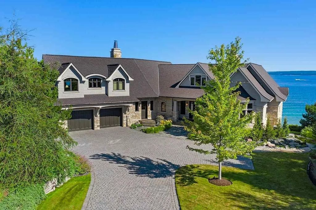 The Estate in Bay Harbor is a luxurious home featuring distinctive exterior with solid stone masonry, limestone and cedar shake, constantly maintained and consistently updated as well as incorporating current technologies and luxury now available for sale. This home located at 6494 Bay Ridge Dr, Bay Harbor, Michigan; offering 04 bedrooms and 05 bathrooms with 6,444 square feet of living spaces.