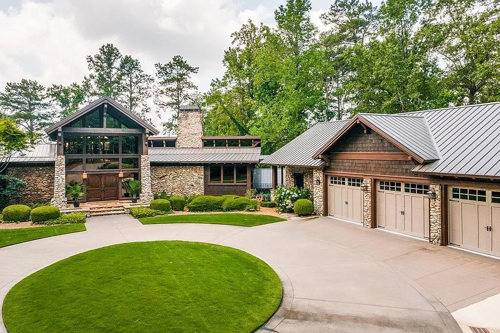 The Home in Columbus is a luxurious home with spectacular water views from almost every room, now available for sale. This home located at 6045 Round Hill Ct, Columbus, Georgia