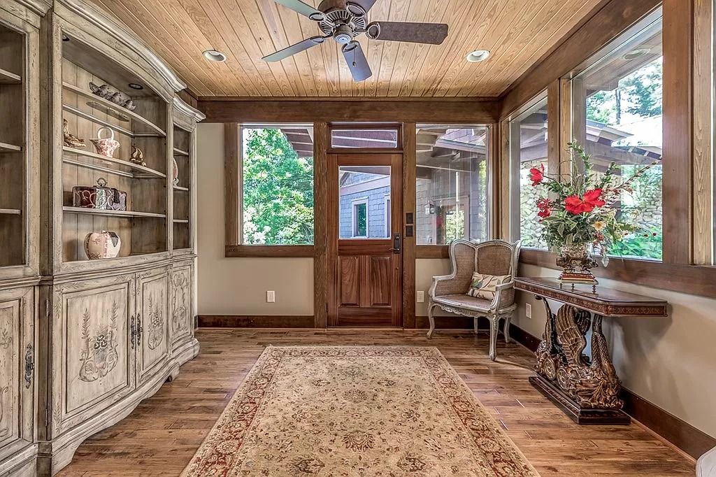 The Home in Columbus is a luxurious home with spectacular water views from almost every room, now available for sale. This home located at 6045 Round Hill Ct, Columbus, Georgia