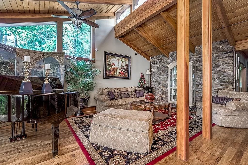 The Home in Columbus is a luxurious home with spectacular water views from almost every room, now available for sale. This home located at 6045 Round Hill Ct, Columbus, Georgia