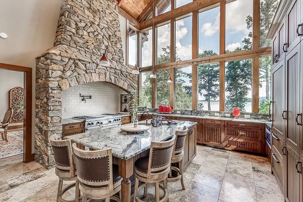 The Home in Columbus is a luxurious home with spectacular water views from almost every room, now available for sale. This home located at 6045 Round Hill Ct, Columbus, Georgia