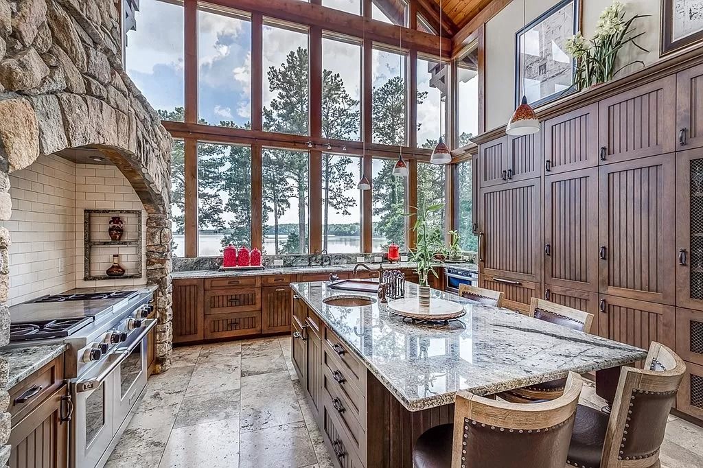 The Home in Columbus is a luxurious home with spectacular water views from almost every room, now available for sale. This home located at 6045 Round Hill Ct, Columbus, Georgia