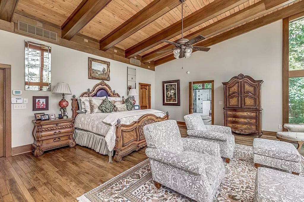 The Home in Columbus is a luxurious home with spectacular water views from almost every room, now available for sale. This home located at 6045 Round Hill Ct, Columbus, Georgia