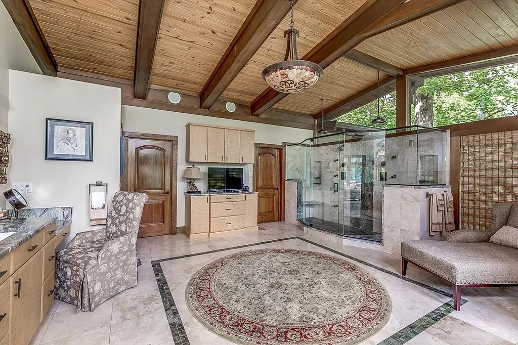 The Home in Columbus is a luxurious home with spectacular water views from almost every room, now available for sale. This home located at 6045 Round Hill Ct, Columbus, Georgia