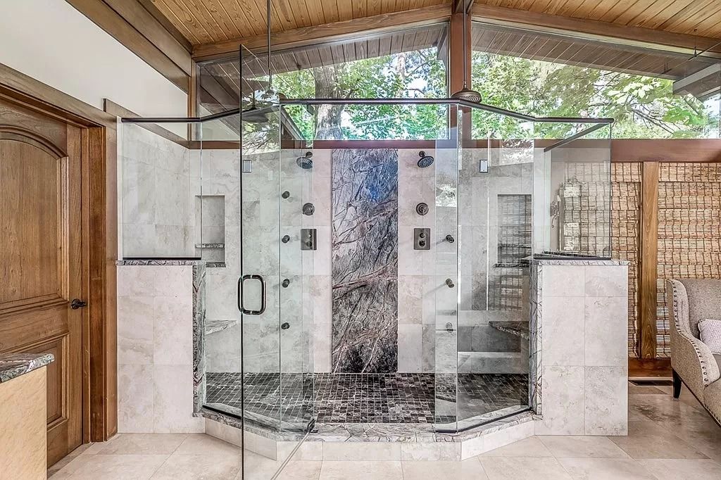 The Home in Columbus is a luxurious home with spectacular water views from almost every room, now available for sale. This home located at 6045 Round Hill Ct, Columbus, Georgia